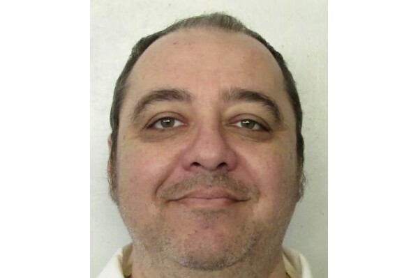 FILE - This undated photo provided by the Alabama Department of Corrections shows inmate Kenneth Eugene Smith, who was convicted in a 1988 murder-for-hire slaying of a preacher's wife. Alabama will be allowed to put Smith to death with nitrogen gas later this month, a federal judge ruled Wednesday, Jan. 10, 2024, clearing the way for what would be the nation’s first execution under a new method the inmate’s lawyers criticize as cruel and experimental. (Alabama Department of Corrections via AP, File)