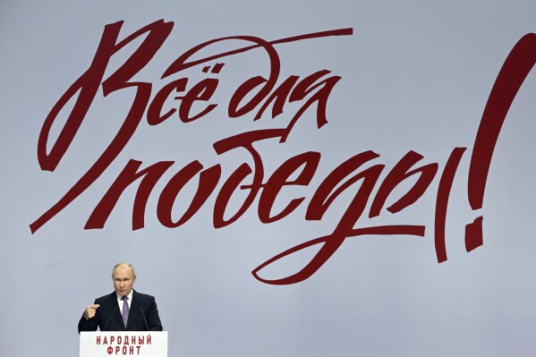 Russian President Vladimir Putin gestures as he addresses a forum titled "All for a Victory!" held by the All-Russia People's Front in Tula, Russia, Friday, Feb. 2, 2024. (Sergei Guneyev, Sputnik, Kremlin Pool Photo via AP)