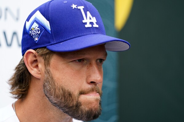 National League's Clayton Kershaw, of the Los Angeles Dodgers, listens to a question during an All-Star Game player availability, Monday, July 10, 2023, in Seattle. The All-Star Game will be played Tuesday, July 11. (AP Photo/Lindsey Wasson)