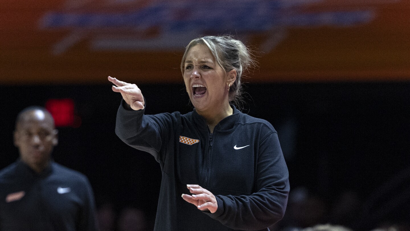 Lady Vols coach Kim Caldwell returns 1 week after giving birth to son
