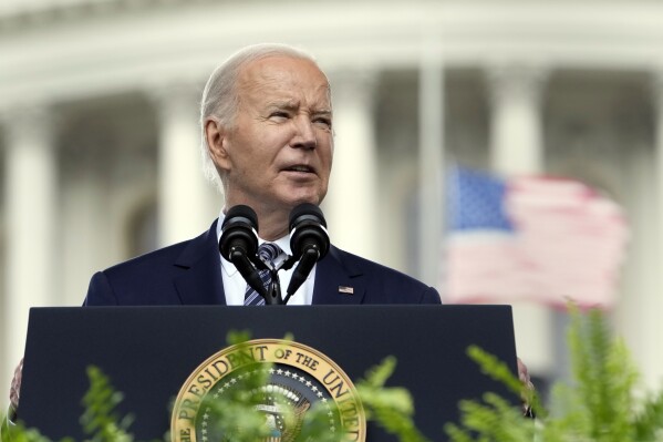 President Joe Biden speaks at a memorial service to honor law enforcement officers who've lost their lives in the past year, during National Police Week ceremonies at the Capitol in Washington, Wednesday, May 15, 2024. (AP Photo/Susan Walsh)