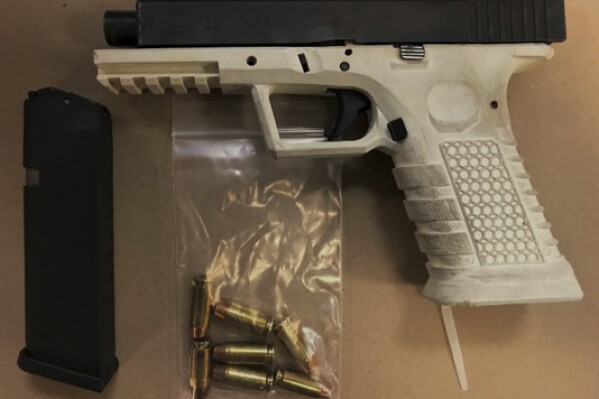 FILE - This image provided by U.S. Attorney's Office for the Eastern District of New York, shows a ghost gun seized in undercover transactions in New York. On Monday, Jan. 1, 2023, gun rights groups filed a federal lawsuit challenging Colorado's ban on so-called ghost guns. (U.S. Attorney's Office for the Eastern District of New York via AP, File)