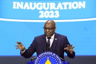 FILE - Illinois Attorney General Kwame Raoul delivers his remarks after being sworn to his second term as attorney general during ceremonies Monday, Jan. 9, 2023, in Springfield, Ill. Raoul on Monday, Jan. 23, 2023, asked a state appellate court to dismiss a temporary restraining order on Illinois' new ban on semiautomatic weapons adopted in response to a mass shooting at the July 4th parade in the Chicago suburb of Highland Park. (AP Photo/Charles Rex Arbogast, File)