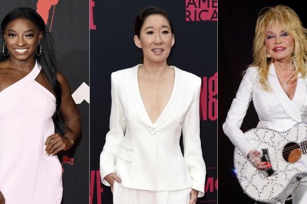 Olympic gymnast Simone Biles appears at the MTV Video Music Awards in New York on Sept. 12, 2021, left, actor Sandra Oh appears at the season two premiere of "Killing Eve" in Los Angeles on April 1, 2019, center, and Dolly Parton appears in concert in Nashville, Tenn., on July 31, 2015. People magazine has named Biles, Oh, Parton and the nation's teachers as its “People of the Year.” (AP Photo)
