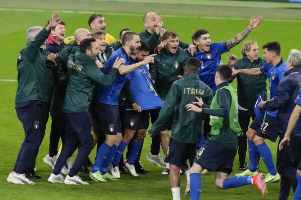 Italy celebrates after defeating Spain in their Euro 2020 soccer championship semifinal at Wembley stadium in London, Tuesday, July 6, 2021. (AP Photo/Matt Dunham,Pool)