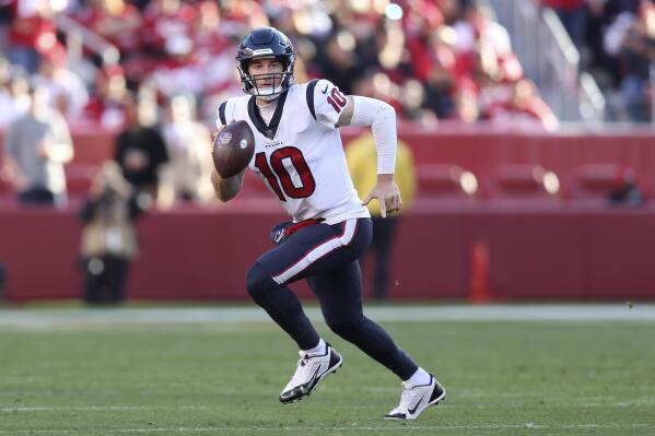 Houston Texans quarterback Davis Mills runs for a touchdown during