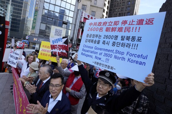 FILE - North Korean defectors and human right activists stage a rally demanding Chinese government to release North Korean defectors captured in China, near the Chinese Embassy in Seoul, South Korea on Sept. 22, 2023. South Korea on Friday, Oct. 13, 2023 said it had expressed its concerns to China after assessing that it recently returned a “large number” of North Koreans, including escapees, back to their homeland. (AP Photo/Ahn Young-joon, File)