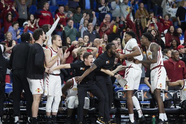 The Iowa State bench celebrates at the end of an NCAA college basketball game against North Carolina in the Phil Knight Invitational tournament in Portland, Ore., Friday, Nov. 25, 2022. Iowa State won 70-65. (AP Photo/Craig Mitchelldyer)
