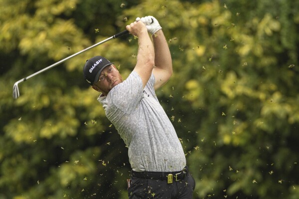 Talor Gooch, of Smash GC, hits during the second round of LIV Golf Singapore at Sentosa Golf Club, Saturday, May 4, 2024, in Sentosa, Singapore. (LIV Golf via AP)