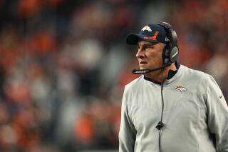 Denver Broncos head coach Vic Fangio watches during the second half of an NFL football game against the Detroit Lions, Sunday, Dec. 12, 2021, in Denver. (AP Photo/Jack Dempsey)