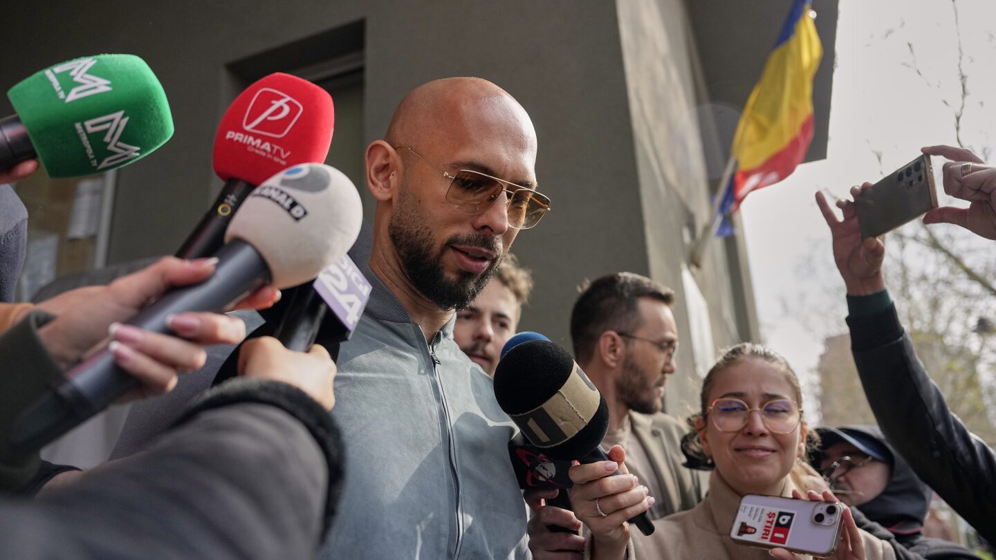 Influencer Andrew Tate accused of pointing gun at woman's face ahead of London civil case