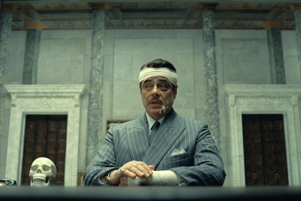 This image released by Focus Features shows Benicio Del Toro in a scene from "The Phoenician Scheme." (TPS Productions/Focus Features via AP)