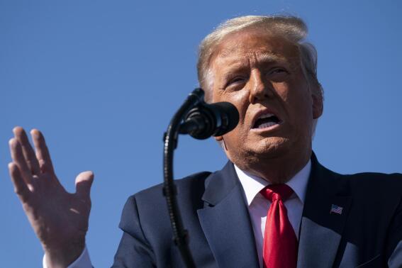 FILE - In this Oct. 28, 2020, file photo President Donald Trump speaks during a campaign rally at Laughlin/Bullhead International Airport in Bullhead City, Ariz (AP Photo/Evan Vucci, File)