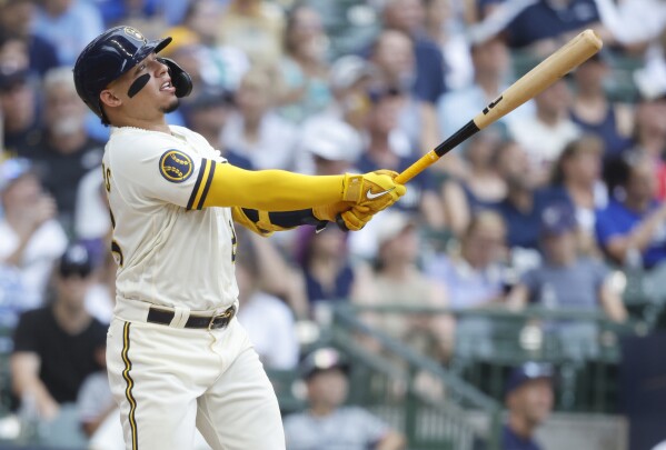 Twins fall to Brewers in extra innings on steamy day in Milwaukee