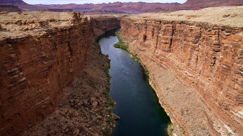 FILE - The Colorado River in the upper River Basin is pictured in Lees Ferry, Ariz., on May 29, 2021. The Supreme Court has ruled against the Navajo Nation in a dispute involving water from the drought-stricken Colorado River. States that draw water from the river — Arizona, Nevada and Colorado — and water districts in California had urged the court to decide for them, and that's what the justices did in a 5-4 ruling. (AP Photo/Ross D. Franklin, File)