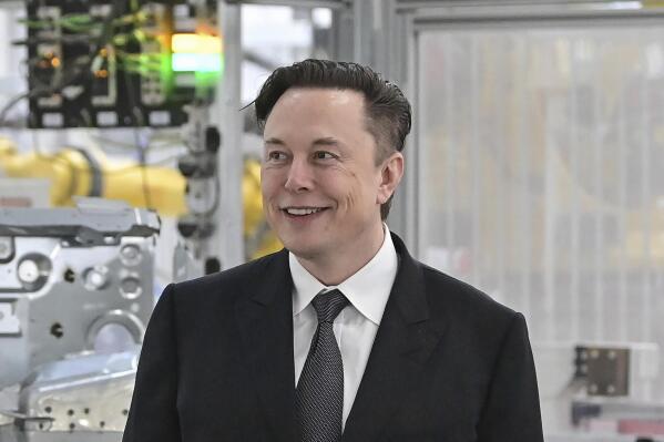 FILE - Tesla CEO Elon Musk attends the opening of the Tesla factory Berlin Brandenburg in Gruenheide, Germany, March 22, 2022. Twitter Inc.’s lawsuit to force billionaire Musk to make good on his promise to buy the social media giant will be resolved in a small but powerful Delaware court that specializes in high-stakes business disputes. (Patrick Pleul/Pool Photo via AP, File)