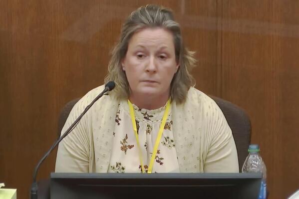 In this screen grab from video, former Brooklyn Center Police Officer Kim Potter takes questions from the prosecution as she testifies in court, Friday, Dec. 17, 2021 at the Hennepin County Courthouse in Minneapolis, Minn.  Potter is charged with first and second-degree manslaughter in the April 11 shooting of Daunte Wright, a 20-year-old Black motorist, following a traffic stop in the Minneapolis suburb of Brooklyn Center. (Court TV, via AP, Pool)