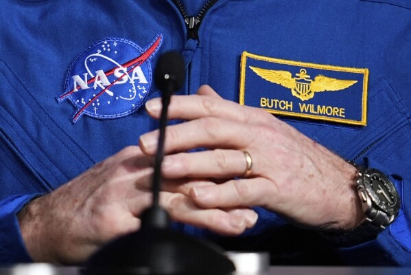 Astronaut Butch Wilmore talks to reporters during a press conference at Johnson Space Center on Monday, March 31, 2025, in Houston. (AP Photo/Ashley Landis)