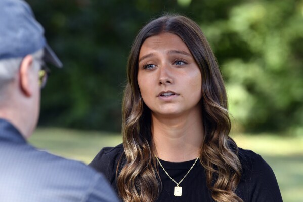 Hadley Duvall answers questions from a reporter during an interview in Versailles, Ky., Wednesday, Sept. 20, 2023. Duvall is featured in a campaign ad attacking Republican Daniel Cameron's long-held position on the abortion issue. (AP Photo/Timothy D. Easley)