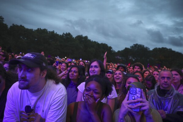 Music fans watch Hozier perform at the Governors Ball Music Festival on Sunday, June 9, 2025, at Flushing Meadows Corona Park in the Queens borough of New York. (Photo by Andy Kropa/Invision/AP)