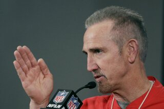 FILE - Kansas City Chiefs defensive coordinator Steve Spagnuolo addresses the media during a news conference at Arrowhead Stadium in Kansas City, Mo., in this Thursday, Jan. 16, 2020, file photo. All four defensive coordinators who will be trying to shut down high-powered offenses in the NFL playoffs this weekend have been head coaches before, providing valuable experience in the conference championships. (AP Photo/Charlie Riedel, File)
