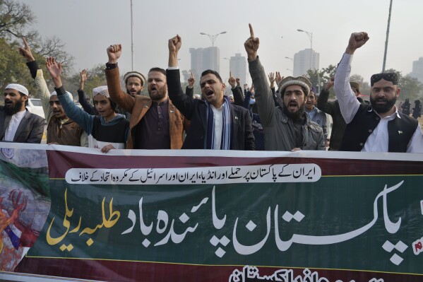 Members of Muslim Talba Mahaz Pakistan chant slogans at a demonstration to condemn Iran strike in the Pakistani border area, in Islamabad, Pakistan, Thursday, Jan. 18, 2024. Pakistan's air force launched retaliatory airstrikes early Thursday on Iran allegedly targeting militant positions, a deadly attack that further raised tensions between the neighboring nations. The banner in the Urdu language reads, 