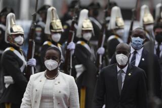 Haiti President Jovenel Moise and his wife First Lady Martine Moise arrive for the inauguration of President-elect Guillermo Lasso at the National Assembly in Quito, Ecuador, Monday, May 24, 2021. (AP Photo/Dolores Ochoa)