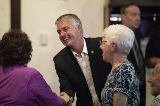 FILE - In this June, 5, 2018 file photo, Then, South Dakota Attorney General Marty Jackley, Republican candidate for governor, greets supporters in Rapid City, S.D. Former Attorney General Jackley says he will run for the state's top law enforcement officer in 2022. Jackley's announcement Monday, March 1, 2021, came as current Attorney General Jason Ravnsborg faces calls for his resignation and impeachment for his involvement in a fatal car crash. (Ryan Hermens/Rapid City Journal via AP, File)