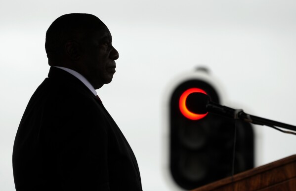 South African President Cyril Ramaphosa addresses members of the defence force during the Armed Forces Day in Richards Bay, South Africa, Tuesday, Feb. 21, 2023. The parade took place as a naval exercise was underway off the east coast of the country with Russian and Chinese navies. (AP Photo/Themba Hadebe)