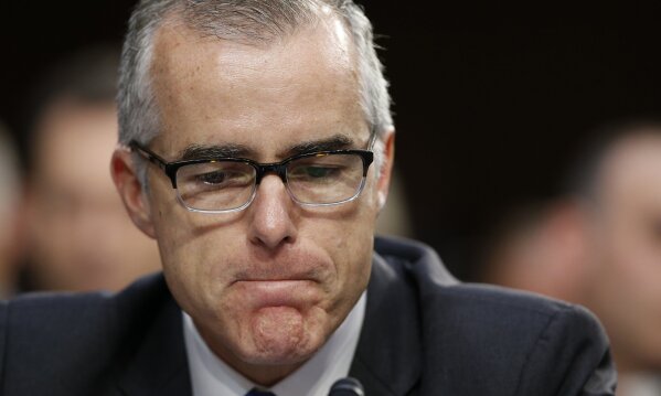 FILE - In this June 7, 2017 file photo, then Acting FBI Director Andrew McCabe pauses during a Senate Intelligence Committee hearing on Capitol Hill in Washington. (AP Photo/Alex Brandon)