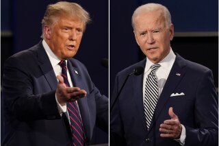 FILE - This combination of Sept. 29, 2020, file photos shows President Donald Trump, left, and former Vice President Joe Biden during the first presidential debate at Case Western University and Cleveland Clinic, in Cleveland, Ohio. Trump and Biden have starkly different visions for the international role of the United States — and the presidency.  (AP Photo/Patrick Semansky, File)