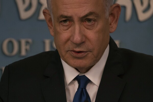 Israeli Prime Minister Benjamin Netanyahu delivers his speech after a meeting with German Chancellor Olaf Scholz in Jerusalem, Sunday, March 17, 2024. (AP Photo/Leo Correa, Pool)