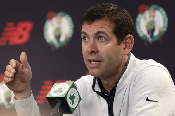 Boston Celtics president of basketball operations Brad Stevens speaks at a news conference during the NBA basketball team's media day, Monday, Oct. 2, 2023, in Boston. (AP Photo/Michael Dwyer)