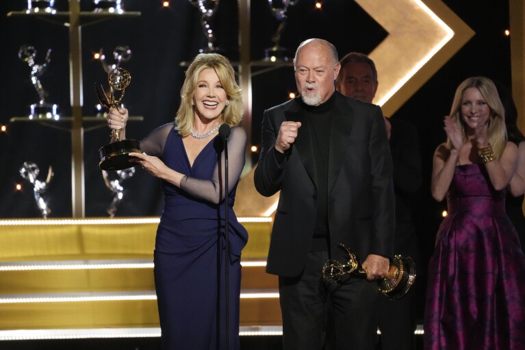 Melody Thomas Scott, left, and Edward J. Scott accept the lifetime achievement awards during the 51st Daytime Emmy Awards on Friday, June 7, 2024, at the Westin Bonaventure in Los Angeles. (AP Photo/Chris Pizzello)