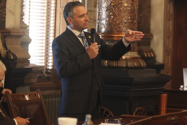 Kansas Senate President Ty Masterson, R-Andover, makes a point during a debate in the Senate chamber at the Statehouse, Monday, April 29, 2024, in Topeka, Kan. Masterson says Democratic Gov. Laura Kelly's reasons for vetoing legislation for cutting taxes have "morphed into the absurd." (AP Photo/John Hanna)