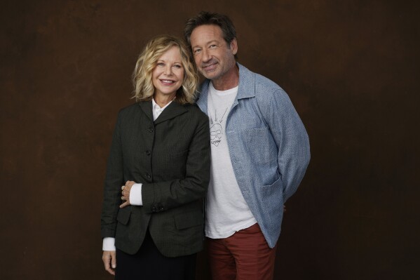 Actor-director Meg Ryan, left, poses with co-star David Duchovny at the Four Seasons Hotel in Los Angeles on Wednesday, Oct. 25, 2023, to promote their film 