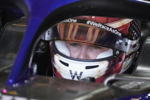 Williams test driver Logan Sargeant sits in his car during the first practice session for the Formula One U.S. Grand Prix auto race at Circuit of the Americas, Friday, Oct. 21, 2022, in Austin, Texas. (AP Photo/Darron Cummings)