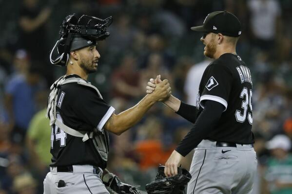 Chicago White Sox catcher Seby Zavala, left, celebrates with pitcher Aaron Bummer after a win over the Detroit Tigers in 11 innings of a baseball game Saturday, Sept. 17, 2022, in Detroit. (AP Photo/Duane Burleson)