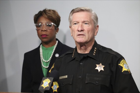 Richland County Sheriff Leon Lott, right, and Councilmember Gretchen Barron speak at a news conference on Monday, Sept. 25, 2023 in Columbia, S.C. (AP Photo/James Pollard)