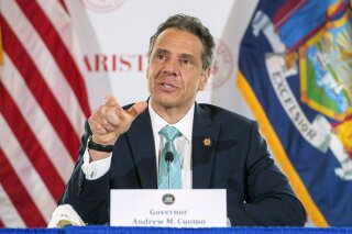 In this photo provided by the Office of Governor Andrew M. Cuomo, Gov. Cuomo briefs the media at Marist College, Friday, May 8, 2020, in Poughkeepsie, N.Y. On Friday, the Governor extended the Child Victims Act filing deadline to January 2021 allowing extra time, allowing New York residents who were sexually abused as children to sue those responsible. The extended deadline is to make up for curtailed court services during the coronavirus pandemic. (Darren McGee/Office of Governor Andrew M. Cuomo via AP)