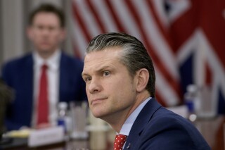 U.S. Defense Secretary Pete Hegseth responds to questions from reporters during a meeting with Britain's Defense Secretary John Healey at the Pentagon, on March 6, 2025, in Washington. (AP Photo/Rod Lamkey, Jr., File)