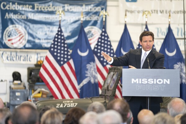 Florida Gov. and Republican presidential candidate Ron DeSantis speaks during a press conference at the Celebrate Freedom Foundation Hangar in West Columbia, S.C. Tuesday, July 18, 2023. DeSantis visited South Carolina to file his 2024 candidacy for president. (AP Photo/Sean Rayford)