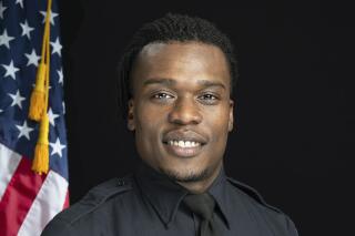 FILE - This undated file photo provided by the Wauwatosa Police Department in Wauwatosa, Wis., shows Wauwatosa Police Officer Joseph Mensah. In a report released Wednesday Oct. 7, 2020, an independent investigator recommended officials in the Milwaukee suburb fire Mensah, who has shot and killed three people in the last five years. (Gary Monreal/Monreal Photography LLC/Wauwatosa Police Department via AP File)