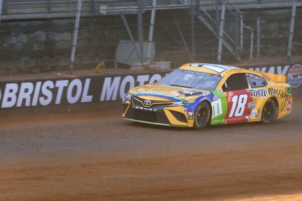 FILE - Kyle Busch drives along the dirt track during NASCAR Cup Series practice, Friday, March 26, 2021, at Bristol Motor Speedway in Bristol, Tenn. Bristol Motor Speedway will ditch the dirt track concept the Tennessee short track has used the last three years and run both of its 2024 NASCAR weekends on the concrete surface. (David Crigger/Bristol Herald Courier via AP, File)