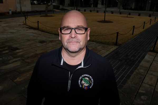 Former Oklahoma City firefighter Chris Fields poses for a photo at the Oklahoma City National Memorial & Museum in Oklahoma City on March 12, 2025. (AP Photo/LM Otero)