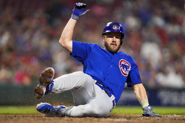 Wisdom's 3 hits, 6-run seventh, power Cubs over Reds 12-5