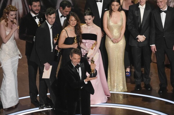 "Anora" filmmakers and cast during the Oscars. (AP Photo/Chris Pizzello)