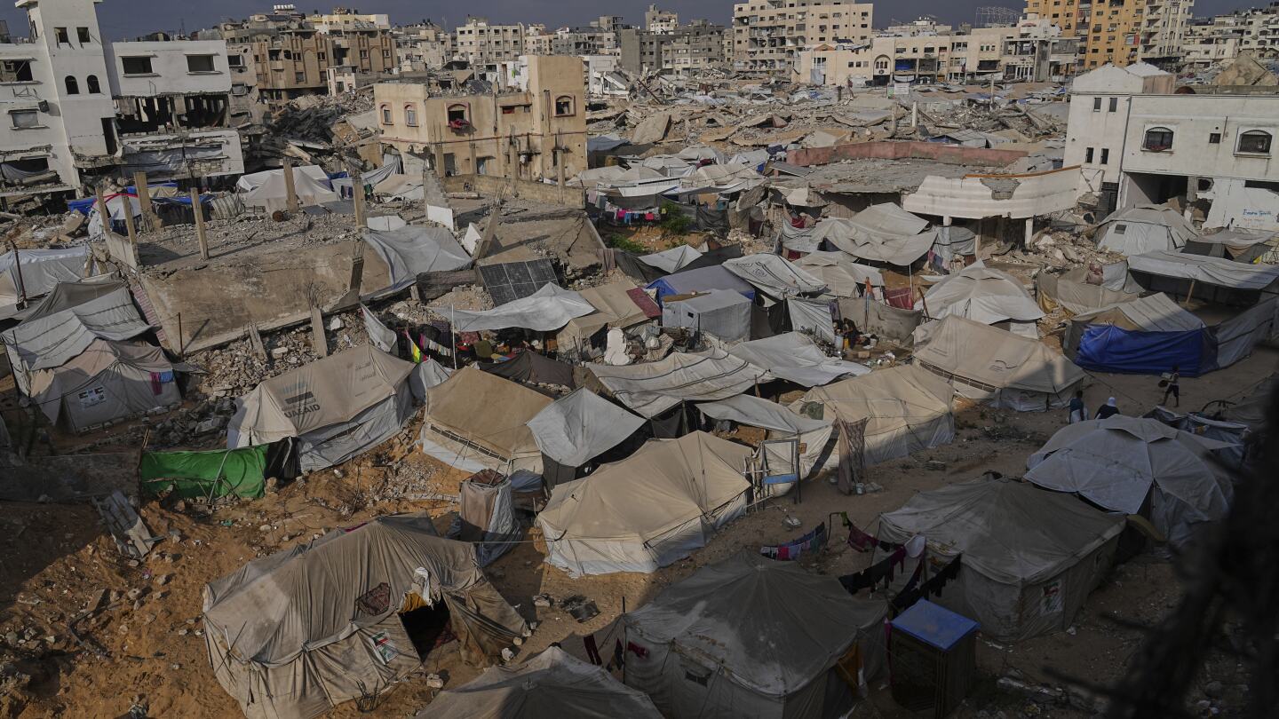 Israeli forces fire on people waiting for aid in Gaza, killing 25, witnesses and hospitals say