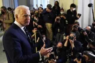 President Joe Biden speaks to the media after meeting privately with Senate Democrats, Thursday, Jan. 13, 2022, on Capitol Hill in Washington. (AP Photo/Andrew Harnik)