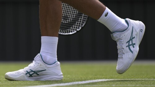 A detail on the shoes of Serbia's Novak Djokovic showing '23' in reference to the number of Grand Slam singles titles he has won, during his men's singles match against Poland's Hubert Hurkacz on day eight of the Wimbledon tennis championships in London, Monday, July 10, 2023. (AP Photo/Alberto Pezzali)